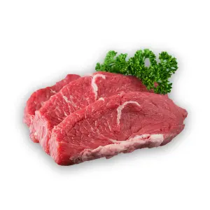 Tres trozos de carne de res adornadas con planta verde